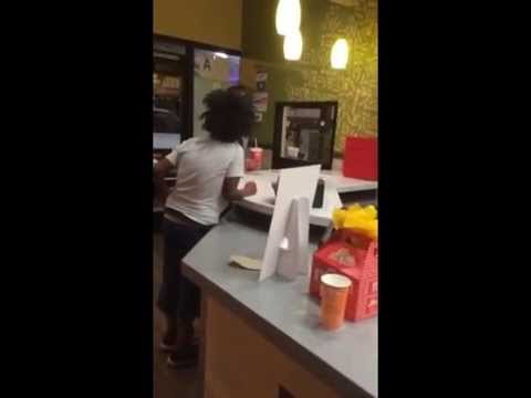 Crazy homeless woman harasses man at Del Taco.