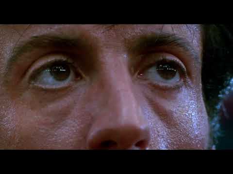 Trailer montage: snowbound training dissolves into red-saturated ring lights