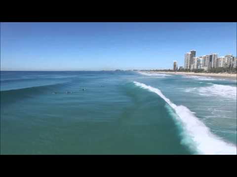 Broadbeach clear water surfing