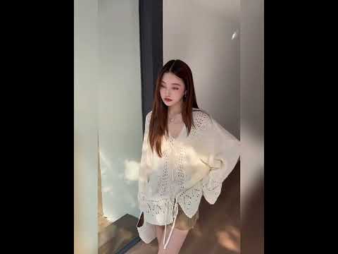 重工手工鉤花鏤空抽繩V領毛衣