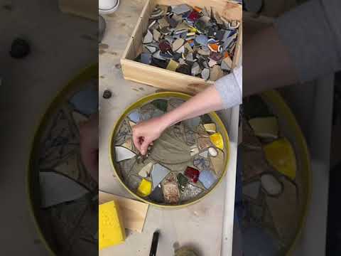 Mosaic art project using broken ceramics. Make a tray.