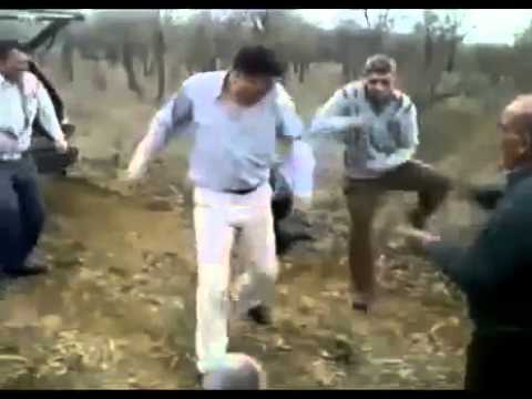 Old men dancing psy trance in the woods during a shamanistic ritual