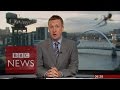 Giant spider photobombs BBC Scotland news.