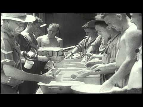 The Australian 9th Division troops arrive on the coast of Lae and move inland in ...HD Stock Footage