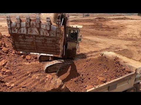 Huge Terex RH170 Shovel Excavator Loading Terex TR100 And Hitachi EH3500 Dumpers