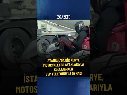İstanbul'da bir kurye, motosikletini ayaklarıyla kullanırken cep telefonuyla oynadı #motokurye