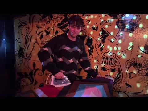 Ironing the Pride Flag at Club Cumming