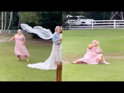 Maid Of Honour Falls Over Trying To Run Out Of Frame