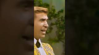 Buck Owens waitin in your welfare line