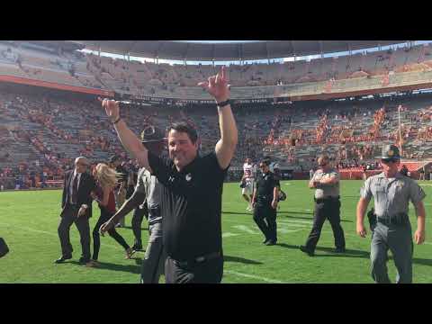Will Muschamp celebrates on field after win at Tennessee