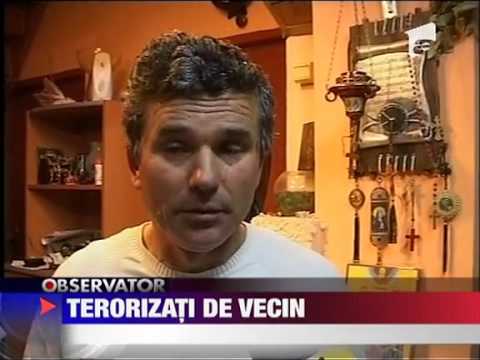 Terorizati de vecinul schizofrenic 30 MARTIE 2011