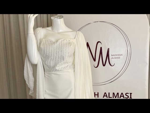 حزام خصر مميز مع فستان ميدي كريب الأبيض