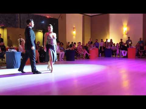  Sebastian Arce  and  Mariana Montes  are  dancing  to  the  tango  "  Gallo Ciego  "  by  Forever Tango  at  Tango Maya Festival  in  2019
