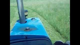 preview picture of video 'mowing hay ford TW-15 tractor john deere 930 MoCo'