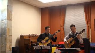 Twins play an amazing duet on guitar