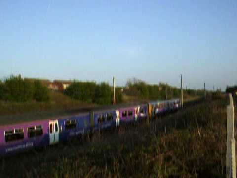 Class 142 passer lead by a Class 150 pass Flag lane