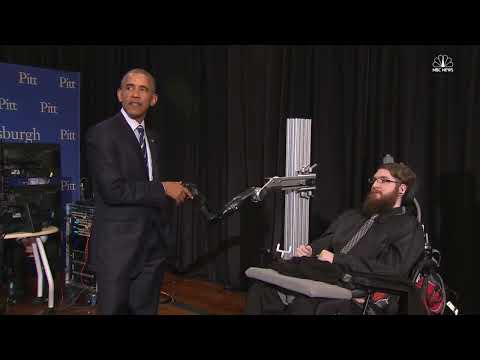 Nathan Copeland shakes Barack Obama's hand with Blackrock Neurotech's BCI: The NeuroPort Array