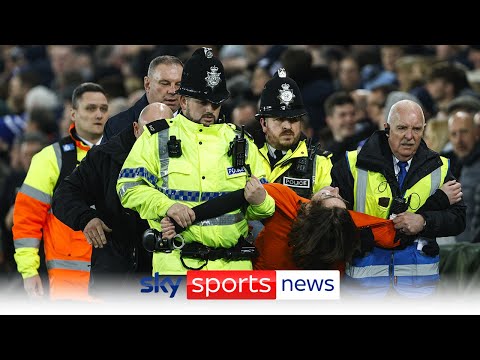 Protester ties himself to a goal post at Goodison Park delaying Everton vs Newcastle game