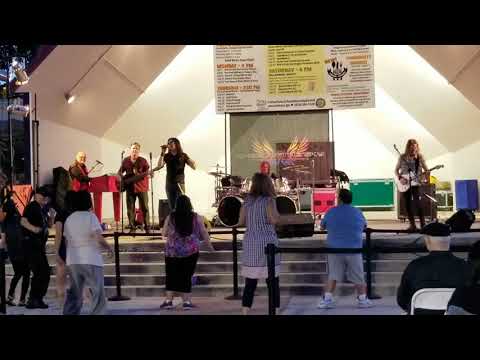 Thumbnail for Girl Can't Help It -  Live in Covina, Performed by Wheel In The Sky by Gary Holland