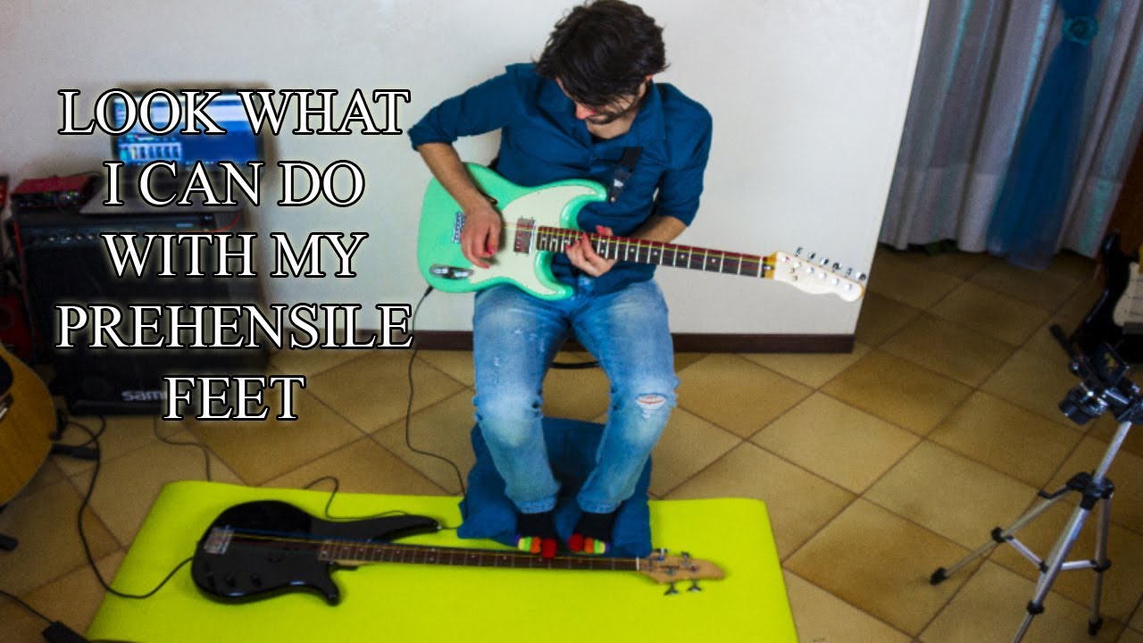 I’m playing bass with feet while doing a guitar solo with my hands