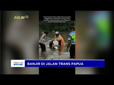 PERSONEL POLRES MERAUKE BANTU WARGA TERDAMPAK BANJIR JALAN TRANS PAPUA