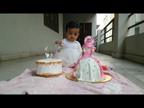 Kyra's First Birthday: Kyra with the Cakes. Part II