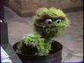 Sesame Street Oscar Walks In His Trashcan