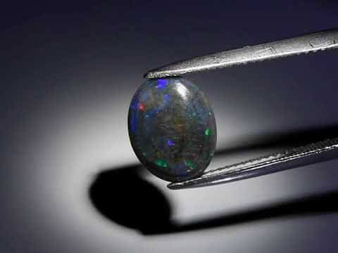 Natuurlijk Opaal Cabochon Kleur Black, Red, Green, Blue, Yellow and Orange Flashing 2,92 ct.