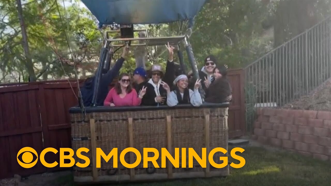 Pilot of hot air balloon carrying 13 people makes emergency landing in California backyard