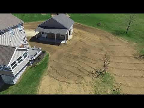 Garage landscape re-do.  Prior to seeding grass.