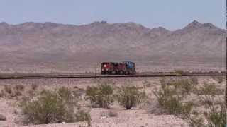 preview picture of video 'BNSF Needles sub - Container train at Ibis. Slow going up the incline.'