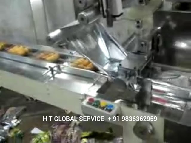 Flow Wrap Machine - Chikki Packing Machine Manufacturer from Faridabad