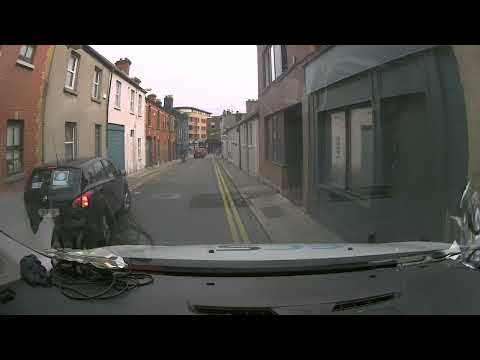 cyclist face plants car while his on his phone and then blames the driver for stopping