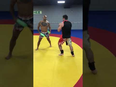 Kenneth Richardson drilling slipping and footwork with Mma champion Andy Devent . Fight Factory