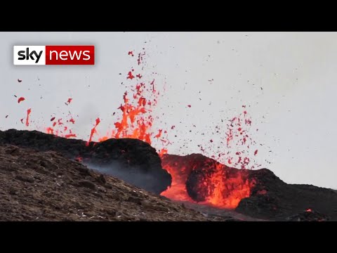 Tourists flock to Iceland volcano, erupting near the capital Reykjavík