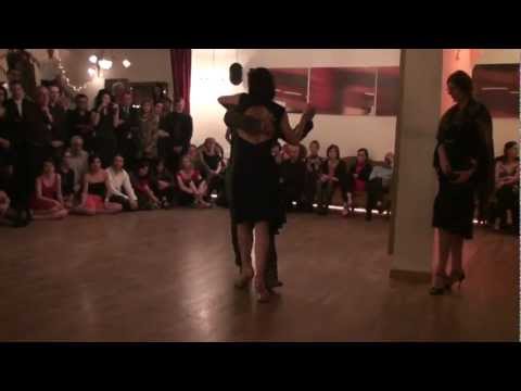  Adrian Costa  and  Amanda Costa  are  dancing  to  the  milonga  "  De Contrapunto  "