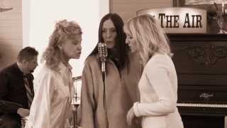 Standing By The Bedside Of A Neighbor