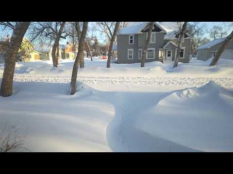 Deep Snow Drifts Caused By the March 31, 2023 South Dakota Blizzard.
