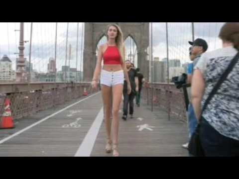 The woman's legs are 49.5 inches long.