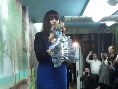 Anthony Rubio Designs with dog model Pebbleiscious at a Pet Fashion Show