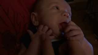 Godric sucking on daddy's finger!