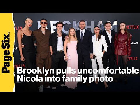 Red carpet video shows Brooklyn Beckham pull uncomfortable Nicola Peltz into family photo