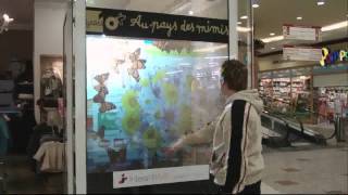 Interactive Projection Window with Transparent Projection Foil