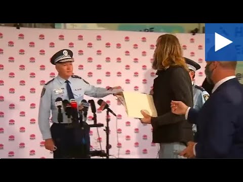 Gladys Berejiklian press conference interrupted by protestor claiming to be God