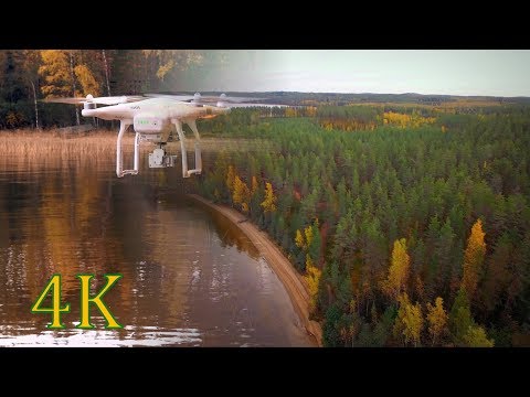 Finland above beautiful autumn lake scenery 4K