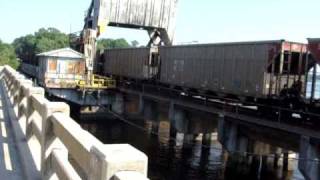 preview picture of video 'CSX Coal Train (N161) Crossing Over Jacksonville's Ortega River Drawbridge 6/9/10'