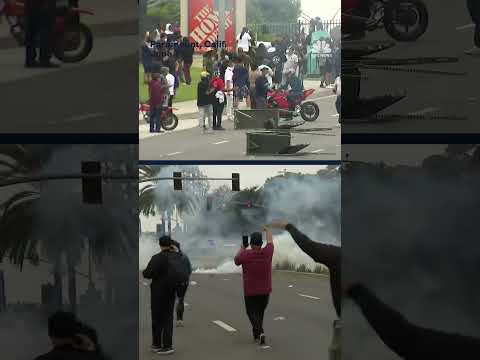 Protesters in Los Angeles clash with federal agents amid ICE raids