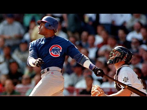 Sammy Sosa belts his 64th and 65th homers of 1998