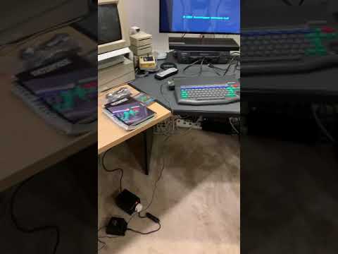 Powering on the obscure Enterprise 64 computer for the first time.