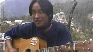 Sitting on a Bench - by Jigme of JJI Exile Brothers